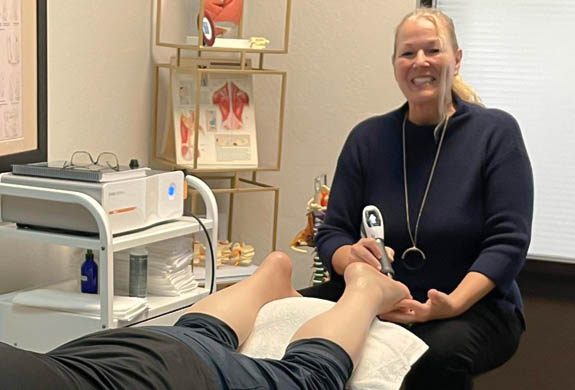 Patient receiving neuropathy treatment at Peninsula RSI Chiropractic Wellness Center in Redwood City